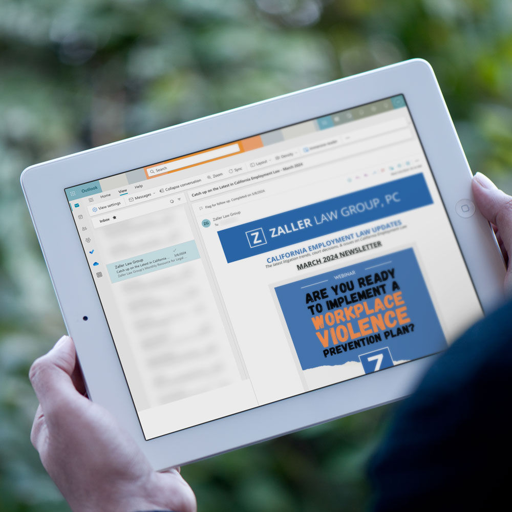 Image of iPad with employment law newsletter in email inbox